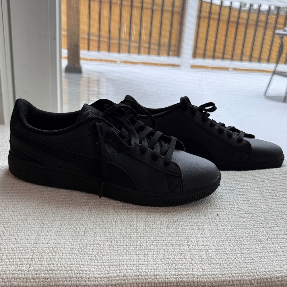 Puma women’s All-Black Sneakers